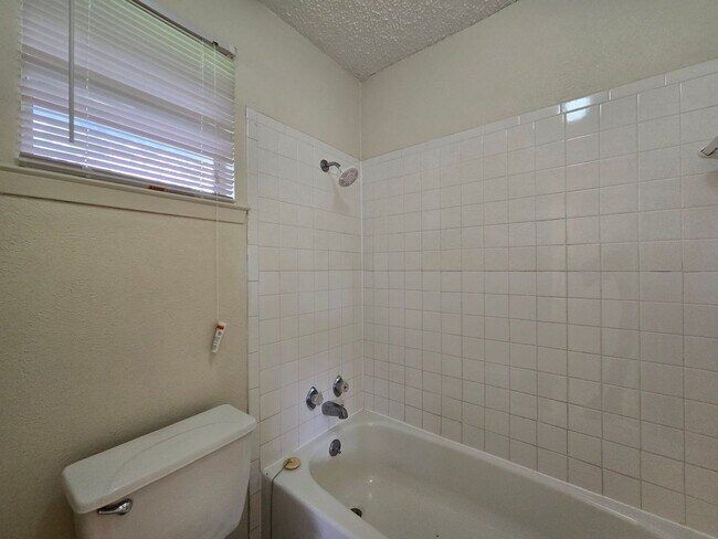 Building Photo - NEW IN MANAGEMENT - AVAILABLE NOW!