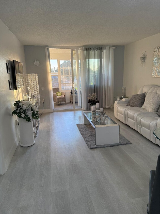 Building Photo - 9360 Lime Bay Blvd