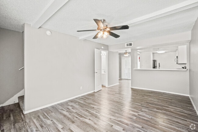 2BR, 1.5BA - 1050SF - Living Room - Woodside Villas Apartments