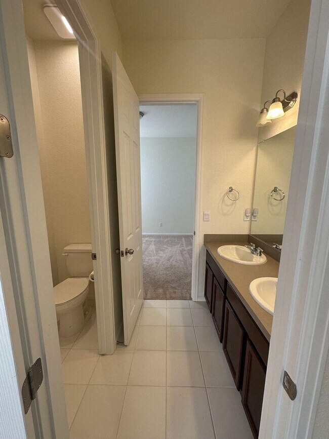 Building Photo - Modern 4-Bed Ranch in Erie with 13-Ft Ceil...