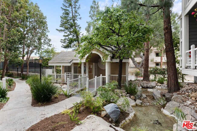 Building Photo - 8505 Gulana Ave