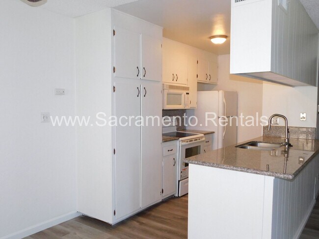 Building Photo - Affordable 2bd/1ba Fourplex with Garage ne...