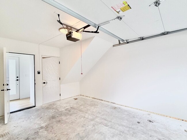 Building Photo - Modern 3-Level Townhome (2020) with Private Garage, Roof Deck & A/C