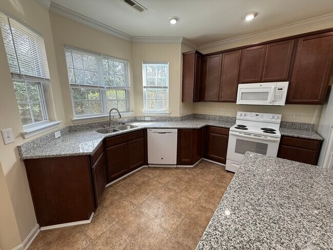 Building Photo - Spacious 2 Bed 2.5 Bath Town Home Available Now! Community Playground!