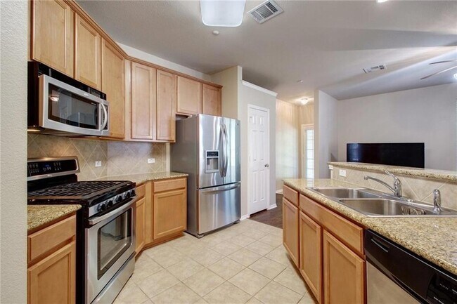 Building Photo - 1310 W Parmer Ln