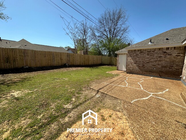 Building Photo - Spacious 4BR/2BA Home in 38141 | Vinyl Flooring & Large Fenced Backyard