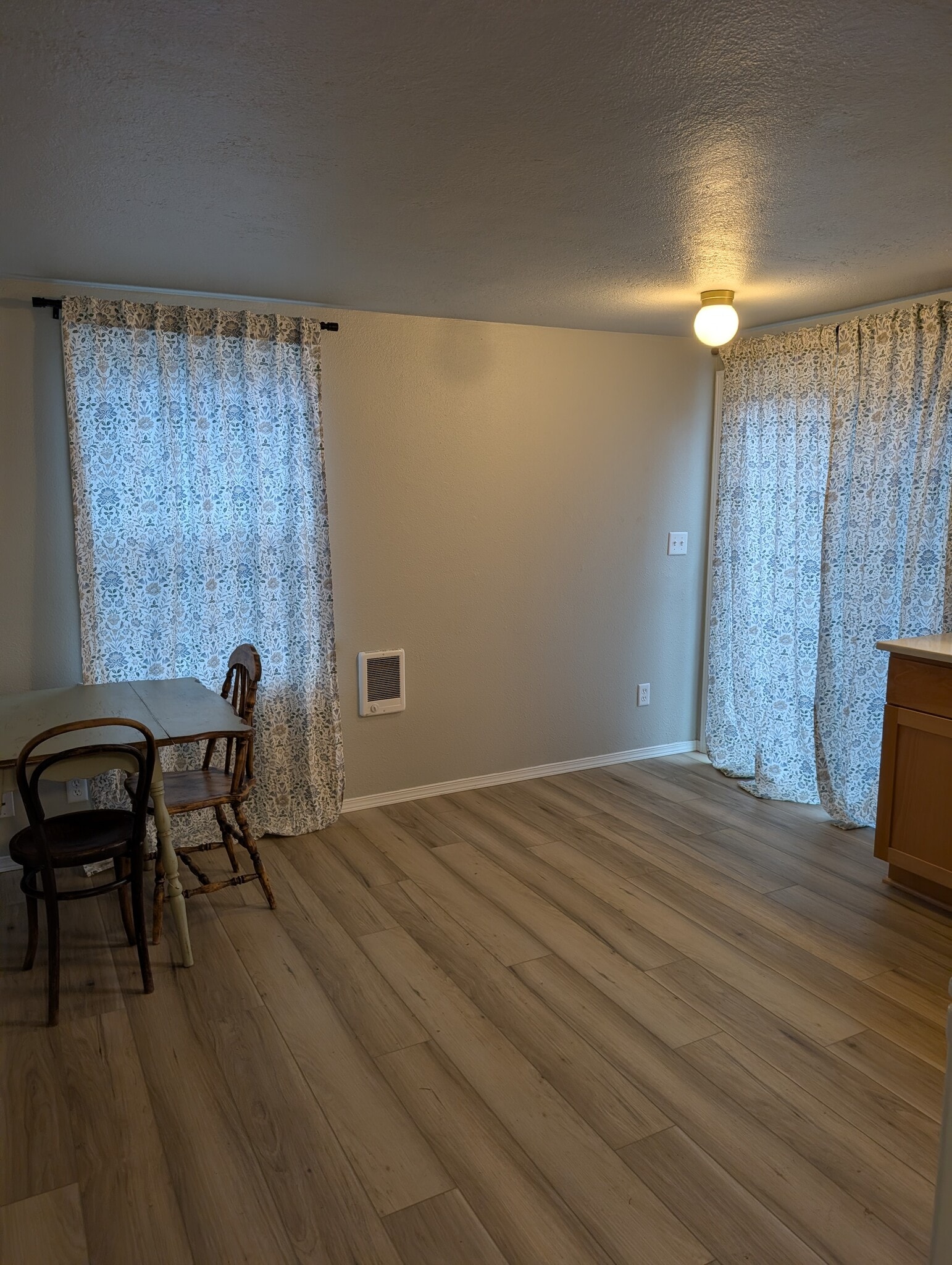Dining/Living room space. - 251 NW Connell Ave