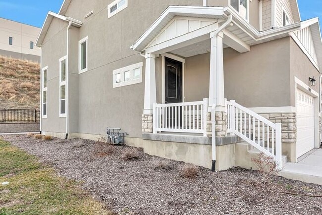 Building Photo - ROW END TOWNHOUSE W 2 CAR GARAGE + AMENITIES