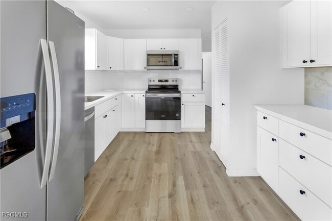 Building Photo - 10697 Holly Rd