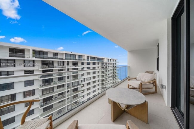 Building Photo - 9801 Collins Ave