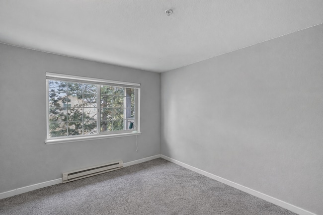 Building Photo - 2BR Condo w/ Vaulted Ceilings, W/D, Parking & Amenities