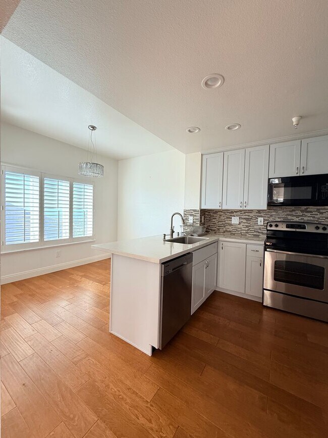 Building Photo - **Coming Soon — Spacious 3BR + 2.5BA Two-Level Condo in Pointe Pacific**