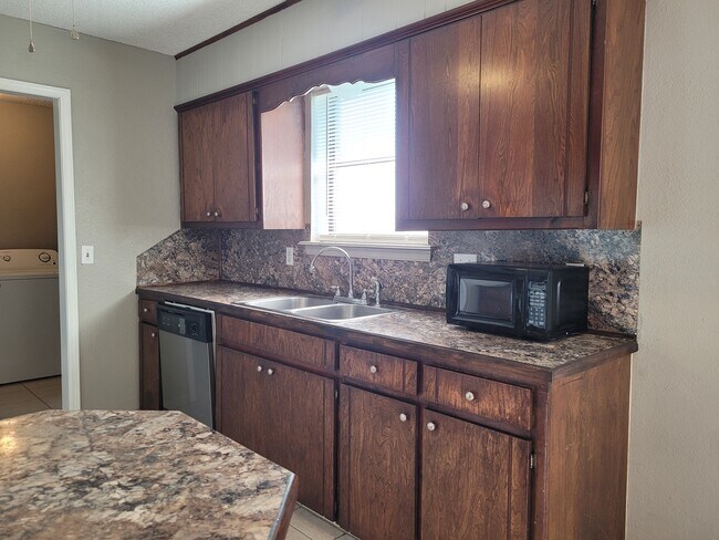 Building Photo - 1437 S Will Rogers Dr