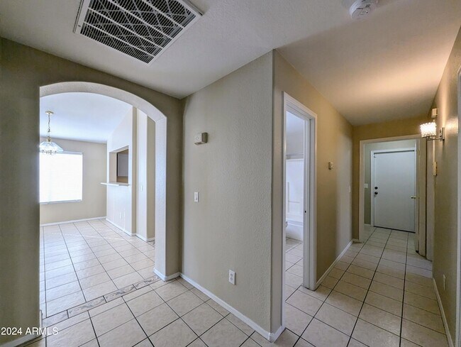 Building Photo - 7059 W Gardenia Ave