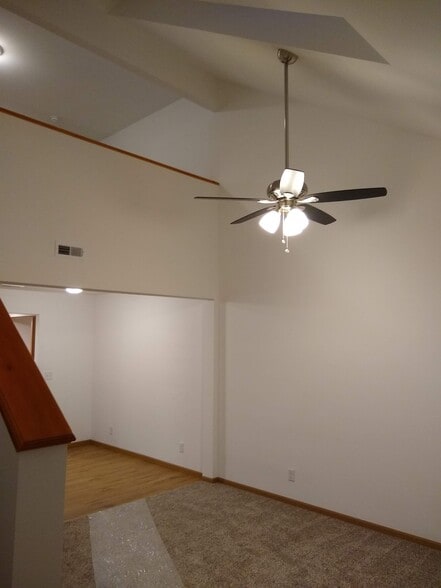 Living room with 1.5 story ceiling and dormer/skylight - Crown Pointe Townhomes - Shiloh
