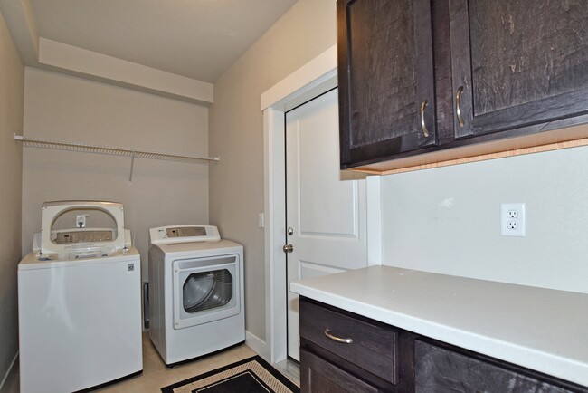 Laundry/mudroom with direct access to garage - 6510 Crystal Downs Dr