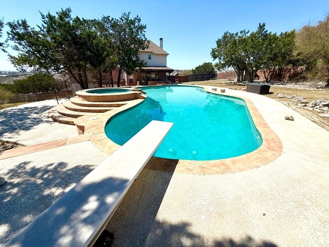 Building Photo - *COMING SOON* Luxurious 2-Story Home in Gated Stone Oak Community – Pool & Lawn Care Included