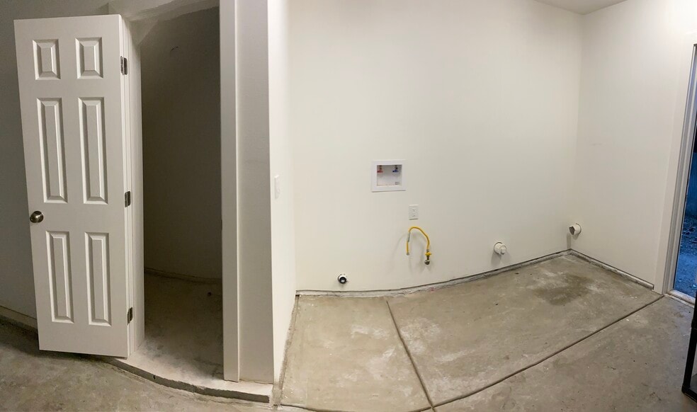Laundry hook up / storage in garage - 210 Burney St