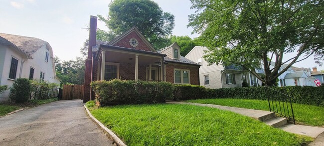 Building Photo - Remodeled brick bungalow with 1st floor li...