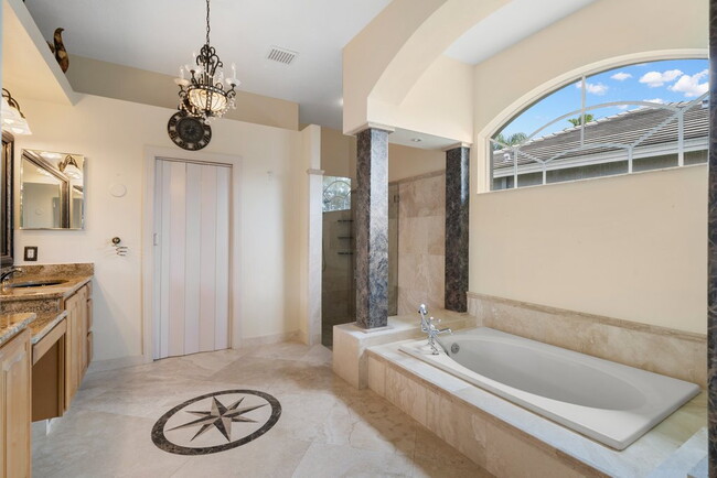 Building Photo - Stunning 5-Bedroom Pool Home in Gated Spyg...