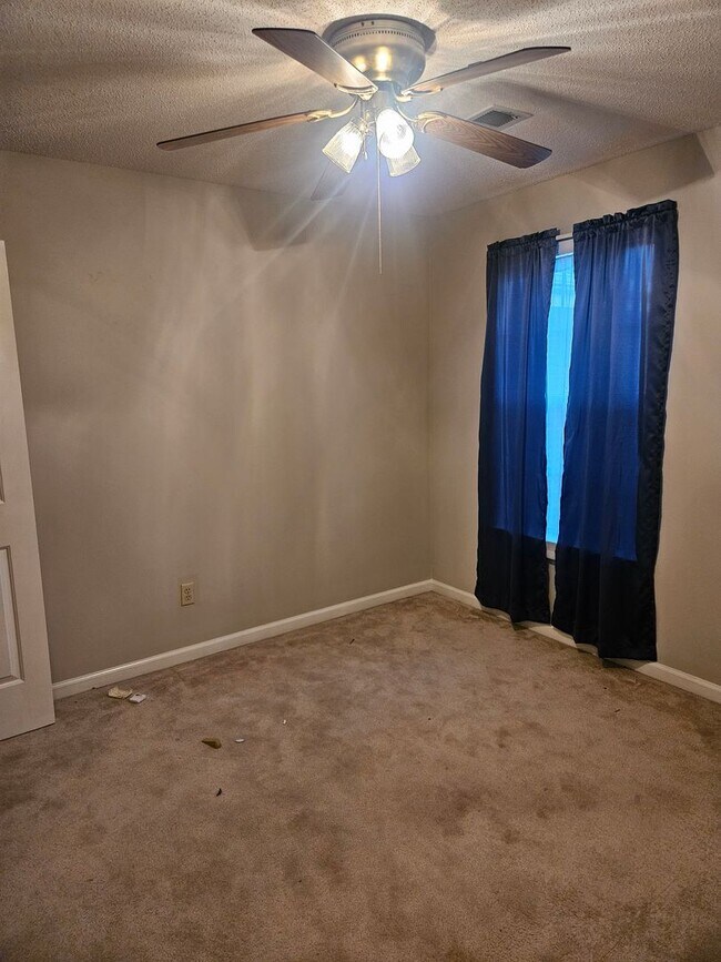 Building Photo - Available Now!   half off first months ren...