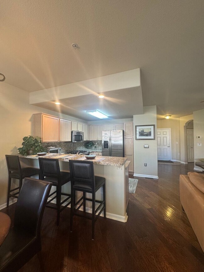 Building Photo - WOW-Factor Alert: Fully Furnished & Remodeled 2BD/2BA First Floor Condo in Wingfield Springs!