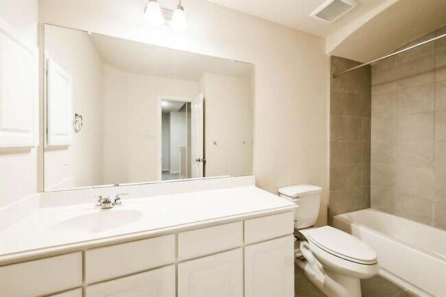 Building Photo - Beautiful stone front 4 bedroom, 3 bath home has bay windows in breakfast nook & master. It is on...