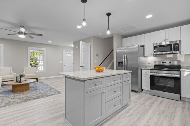 Building Photo - Charming 3-Bed Home with Granite Touches & Finished Basement in Raleigh!