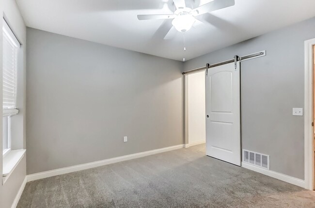 Building Photo - 7128 Triumph Ln