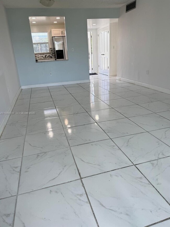 Building Photo - 8135 Sunrise Lakes Blvd