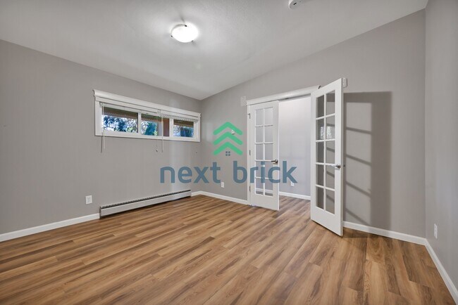 Building Photo - Downtown Bellevue Living | 2BR Condo with Storage & Balcony