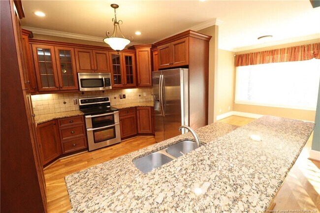 Building Photo - 7124 Blue Juniper Ct