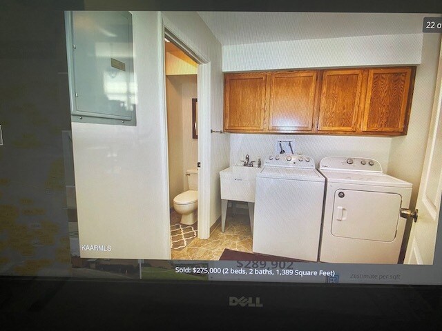 Laundry Room with half bath - 130 Olympia Dr