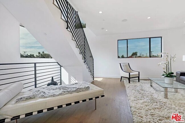 2nd level great room. Not pictured: smart roller blinds on every window - 6077 Hargis St