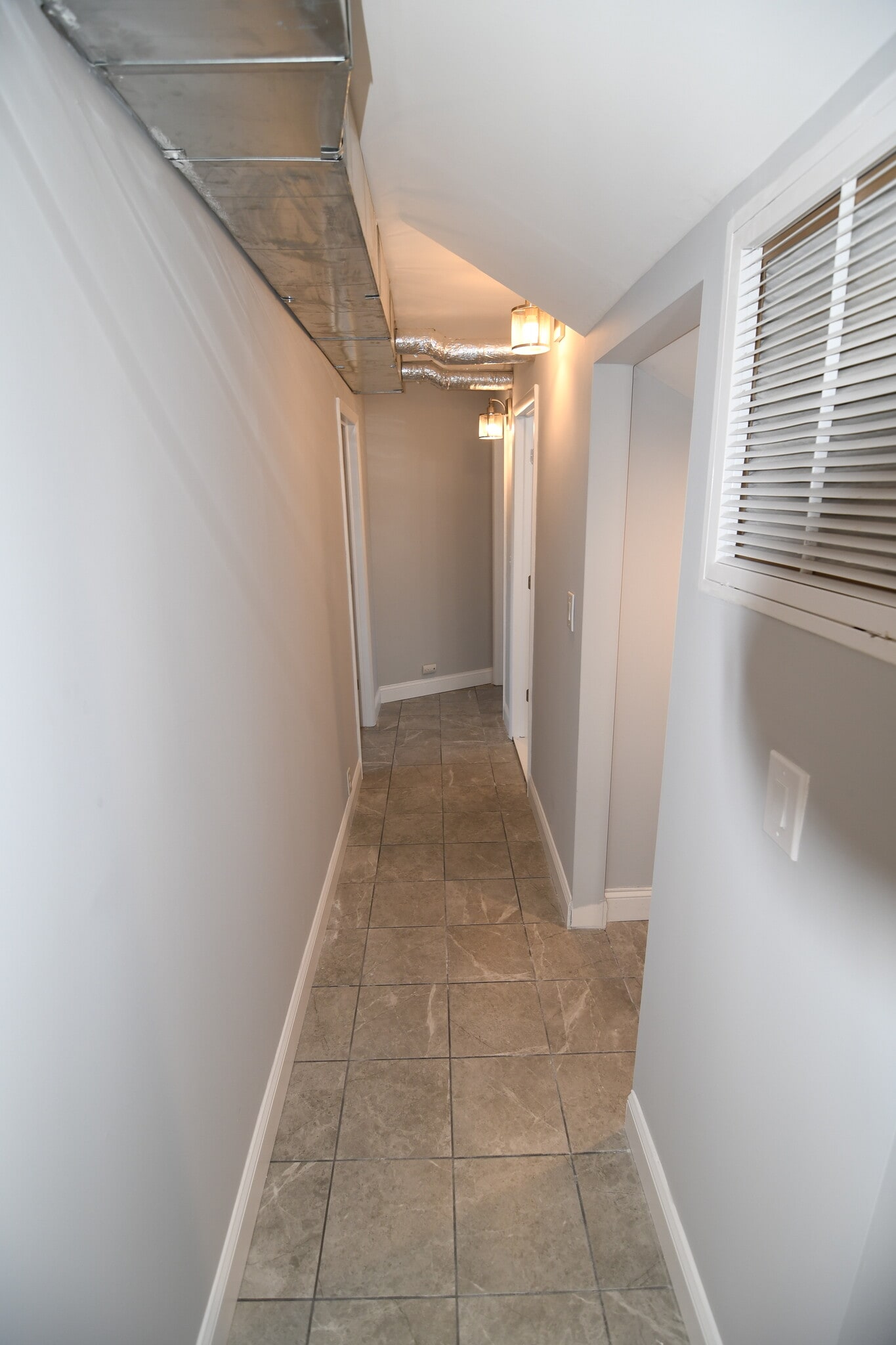 Tile extends down the hallway. - 309 Old York Rd