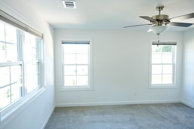 Building Photo - Like-new 3 bedroom, 2.5 bath house with an organic pond!