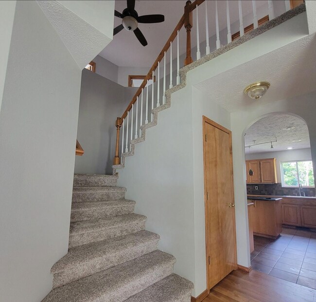 Upstairs leading to bedrooms - 4311 E 41st Ave