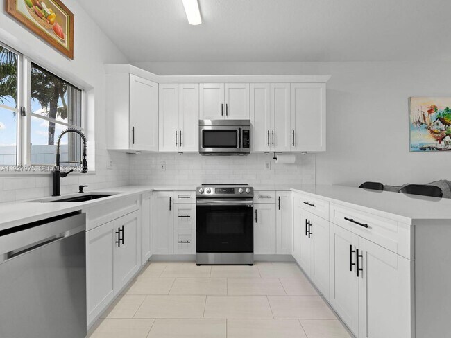 Building Photo - 12881 SW 49th Ct