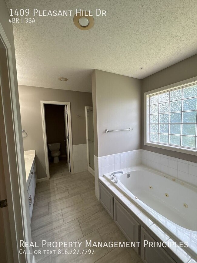 Building Photo - 1409 Pleasant Hill Dr