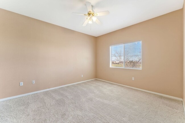 Building Photo - Bright & Stylish Condo with Fireplace and Private Balcony in a Resort-Style Community!