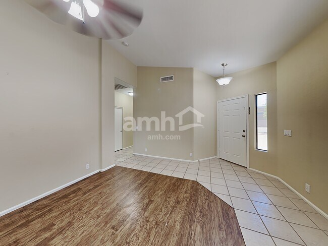 Building Photo - 8746 W Cherry Hills Dr