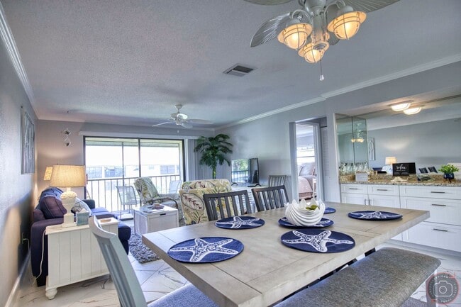 Building Photo - Seasonal Short-Term 2-Bedroom 2-Bath 2nd Floor Condo Located at Mission Lakes!