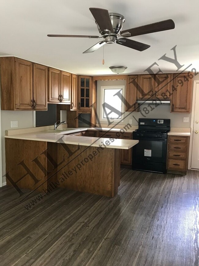Building Photo - Four Bedroom, Two Bathroom Home