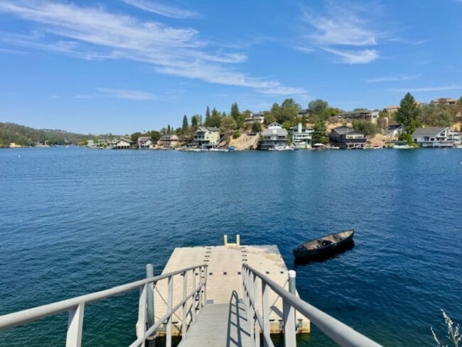 Building Photo - Home located in a gated Lakefront community with 3 swim areas & a boat dock