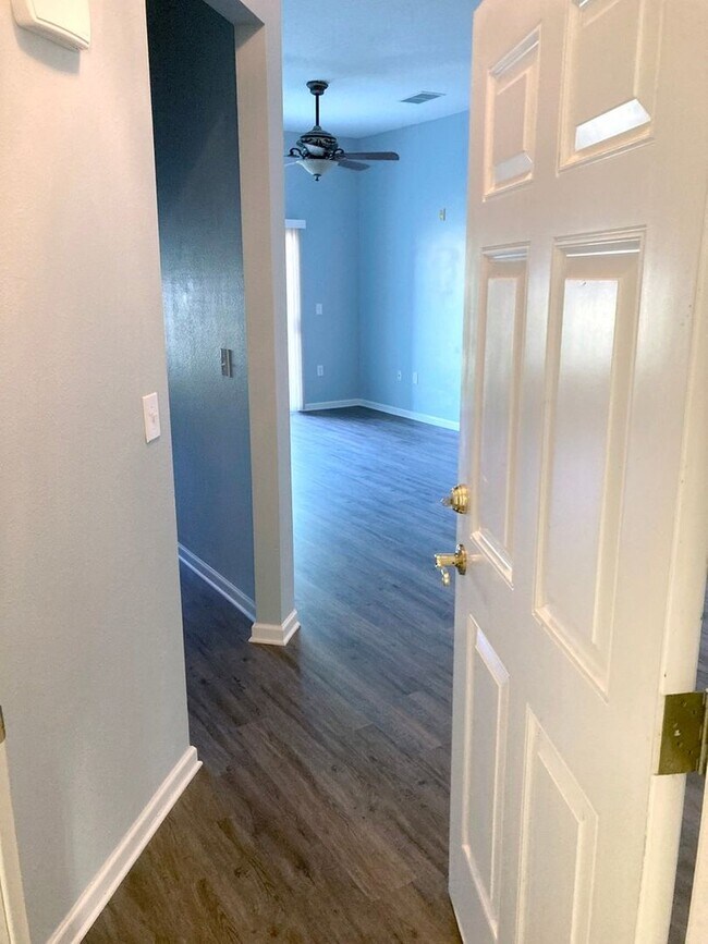 Building Photo - Spacious 3-Bedroom Condo with Pond Views &...