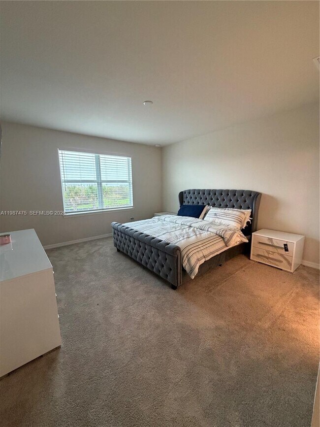 Building Photo - 12251 SW Periwinkle Ct