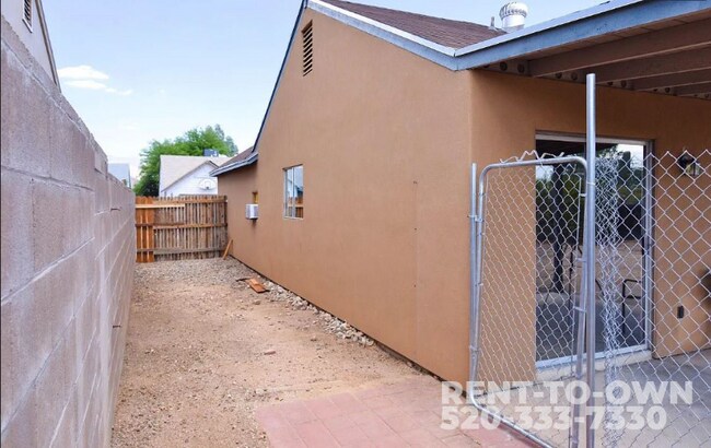 Building Photo - 8661 N Newhill Ave