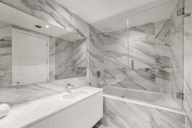 Building Photo - 10203 Collins Ave