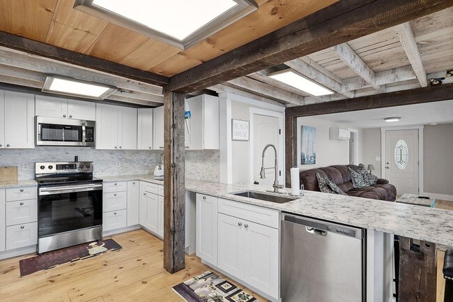 Building Photo - *Price Drop!* Your Dream Winter Retreat Aw...