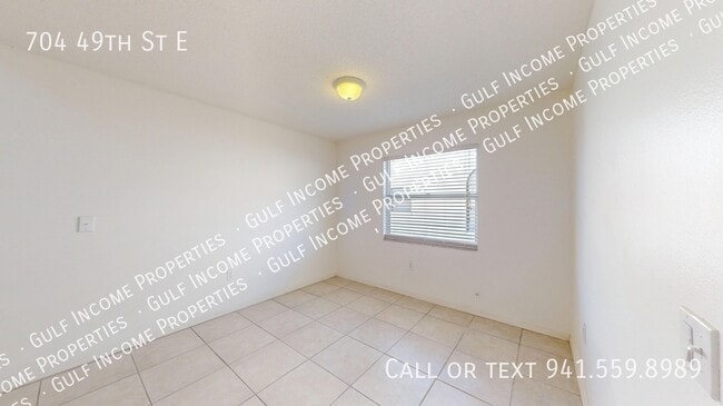 Building Photo - 704 49th St E